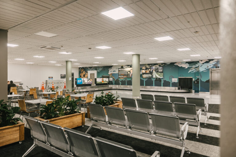 Baggage belt and arrivals area in the temporary terminal